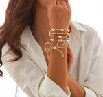 Gold + Pearl Bow Bracelet Stack